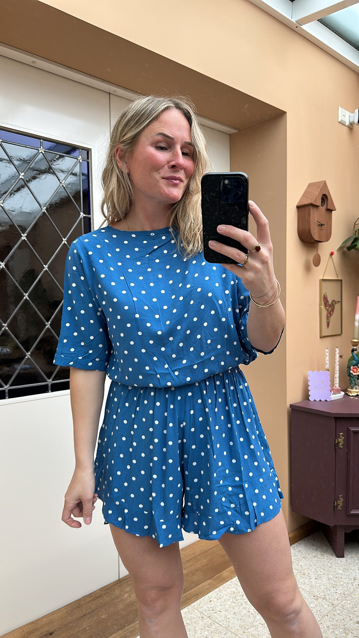 Daune - blauwe playsuit met stipjes
