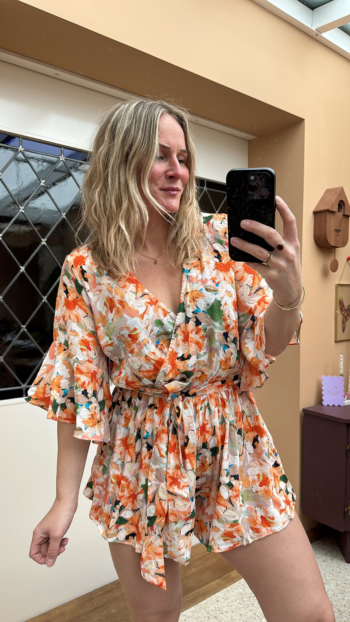 Dilas v-neck - playsuit bloemen oranje