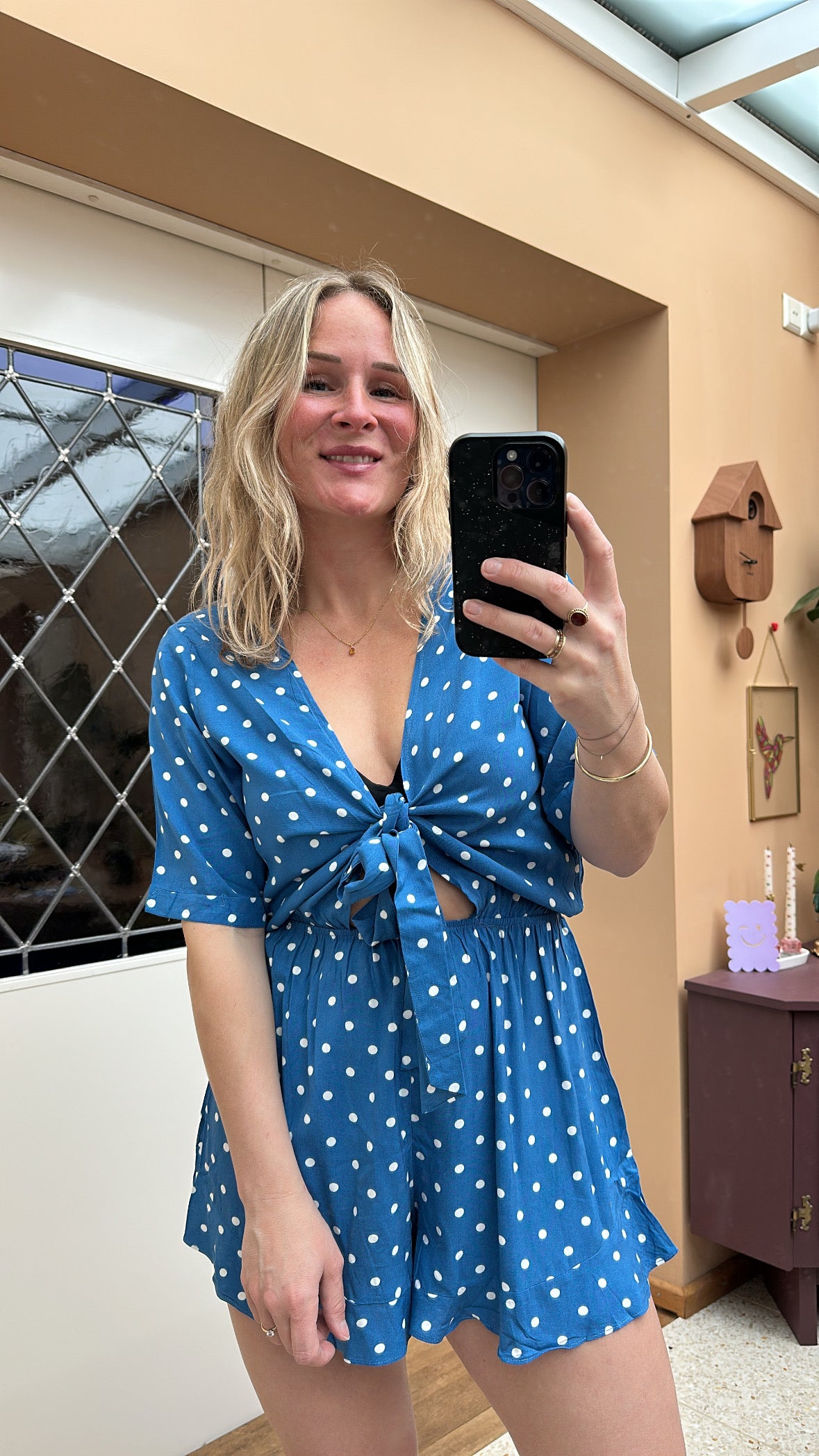 Daune - blauwe playsuit met stipjes
